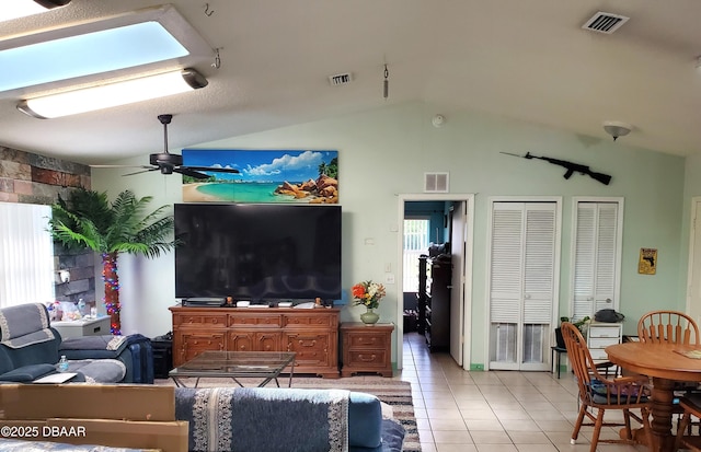 20 Lake Meadow Way, Ormond Beach, FL 32174 - living room featuring vaulted ceiling, light tile patterned flooring, and ceiling fan