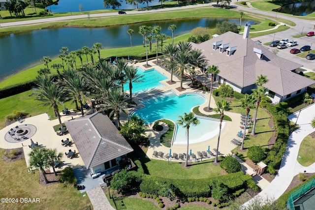 birds eye view of property featuring a water view