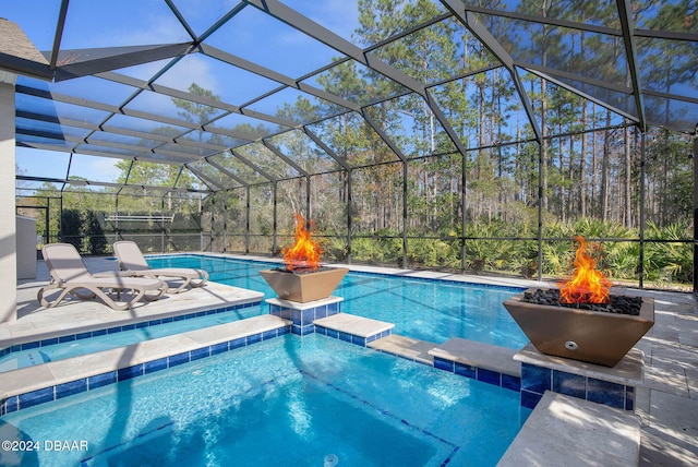 view of pool with a lanai