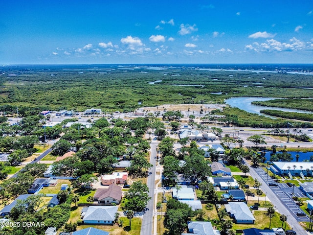 650 S Pine St, New Smyrna Beach, FL 32169 - bird's eye view featuring a water view and a residential view