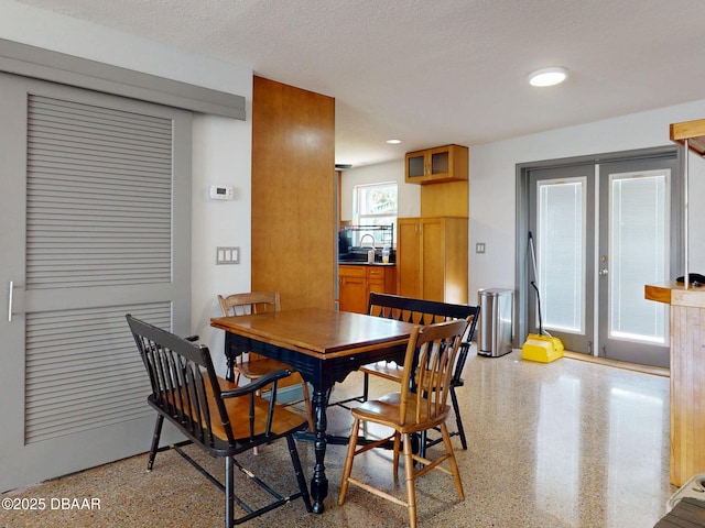 650 S Pine St, New Smyrna Beach, FL 32169 - dining area featuring light speckled floor and french doors