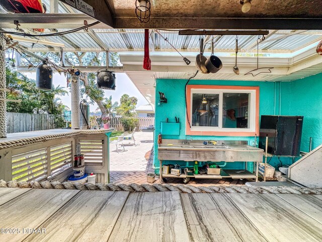 650 S Pine St, New Smyrna Beach, FL 32169 - wooden deck featuring fence