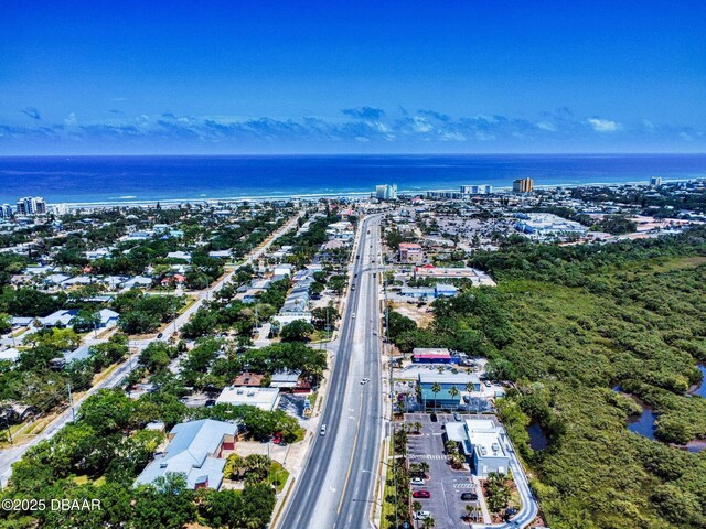 650 S Pine St, New Smyrna Beach, FL 32169 - birds eye view of property featuring a city view and a water view