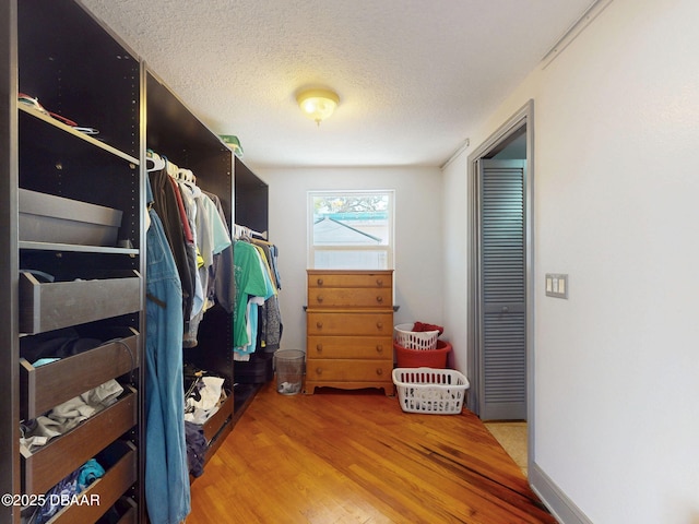 650 S Pine St, New Smyrna Beach, FL 32169 - spacious closet featuring wood finished floors