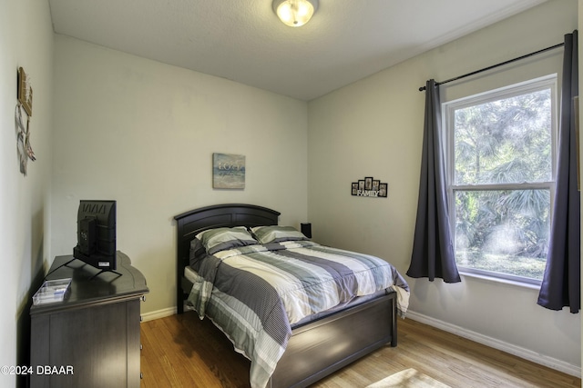 bedroom featuring light hardwood / wood-style flooring