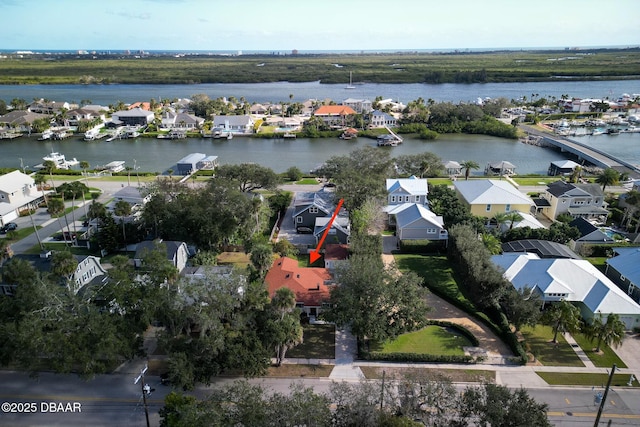 drone / aerial view with a water view