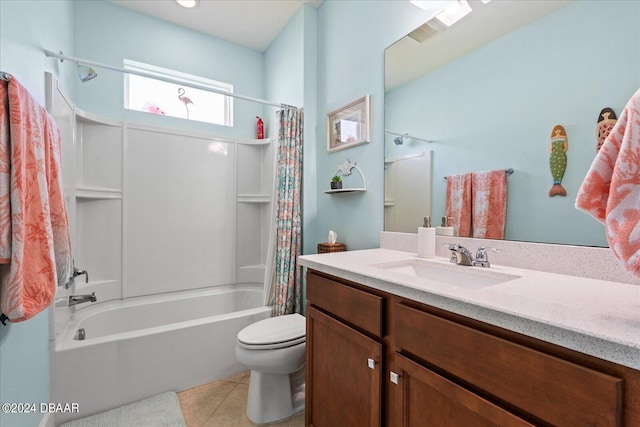 full bathroom featuring toilet, vanity, tile patterned floors, and shower / bathtub combination with curtain