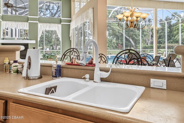 1766 Roscoe Turner Trl, Port Orange, FL 32128 - kitchen view of a sink and a chandelier