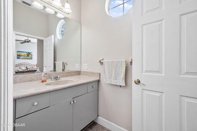 1766 Roscoe Turner Trl, Port Orange, FL 32128 - bathroom featuring vanity, tile patterned flooring, and ceiling fan
