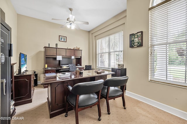 1766 Roscoe Turner Trl, Port Orange, FL 32128 - office space featuring a ceiling fan, healthy amount of natural light, baseboards, and light colored carpet