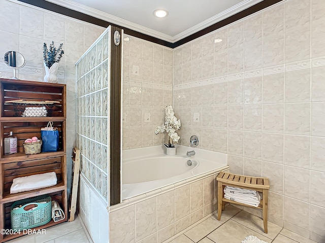 bathroom featuring tile patterned floors, tiled tub, tile walls, and ornamental molding