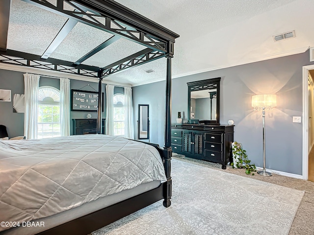 bedroom featuring carpet and crown molding