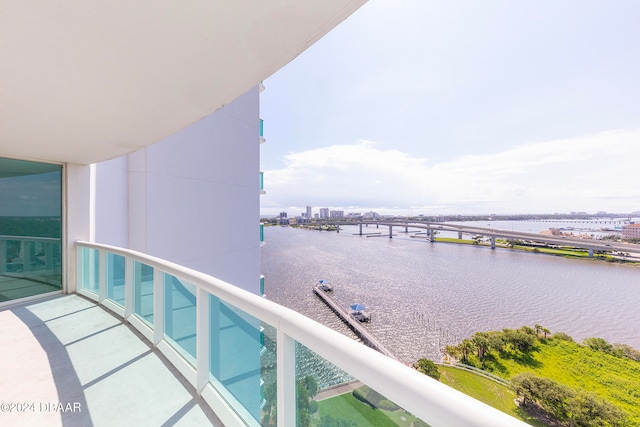 balcony featuring a water view