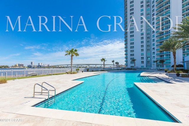 view of pool featuring a patio