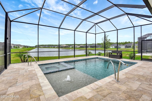 view of pool featuring glass enclosure, a patio area, a water view, and an in ground hot tub