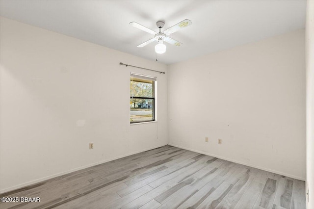 unfurnished room with ceiling fan and light hardwood / wood-style floors