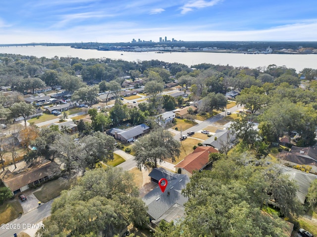 birds eye view of property featuring a water view