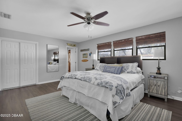 bedroom featuring ceiling fan and dark hardwood / wood-style flooring