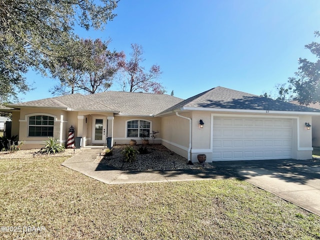 ranch-style home featuring a garage and a front lawn