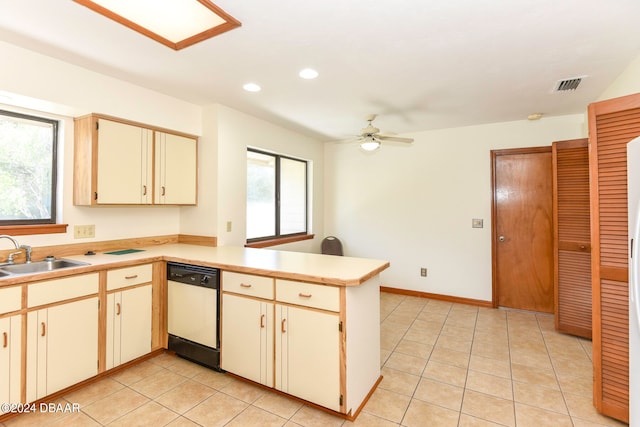 kitchen with dishwasher, kitchen peninsula, plenty of natural light, and sink