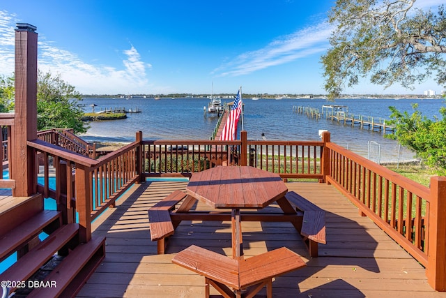 view of dock with a water view