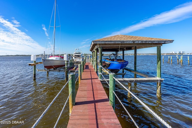 dock area featuring a water view and boat lift