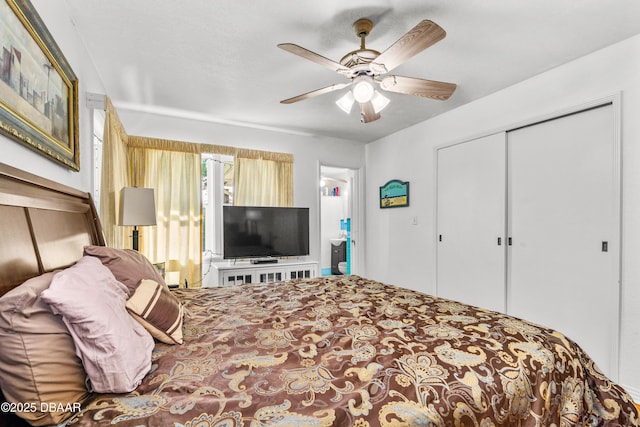 bedroom with a closet and ceiling fan