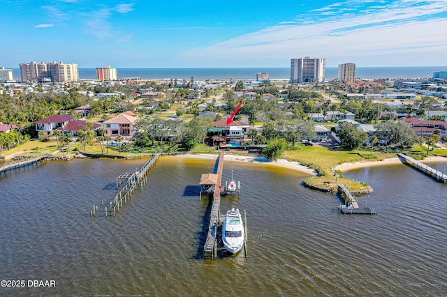 drone / aerial view featuring a water view