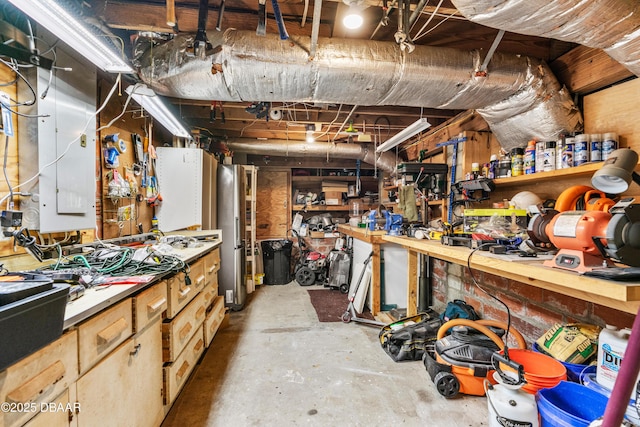 interior space with concrete flooring and a workshop area