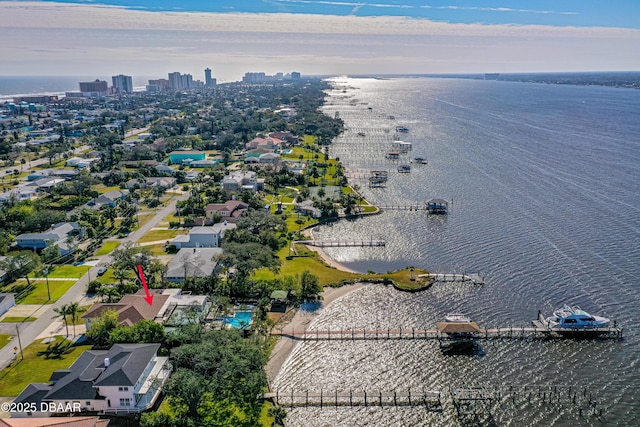 bird's eye view with a water view