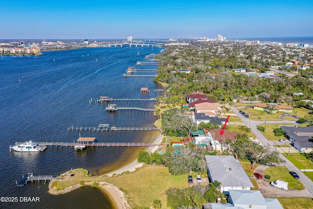 birds eye view of property featuring a water view