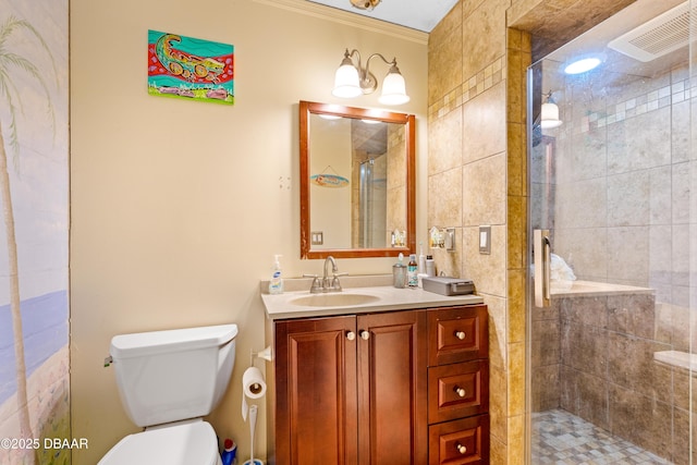 bathroom featuring crown molding, vanity, toilet, and an enclosed shower