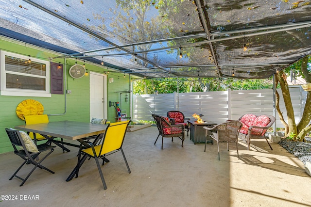 view of patio featuring an outdoor fire pit