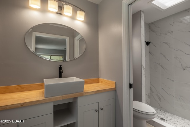 131 Lake Charles Rd, Deland, FL 32724 - bathroom with a marble finish shower, toilet, and vanity
