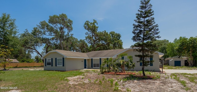 131 Lake Charles Rd, Deland, FL 32724 - single story home featuring a storage unit and an outbuilding