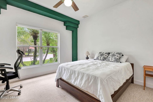 2 Creek Bend Way, Ormond Beach, FL 32174 - carpeted bedroom with a desk and a ceiling fan