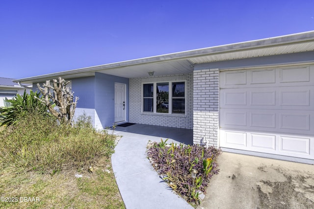 entrance to property with a garage