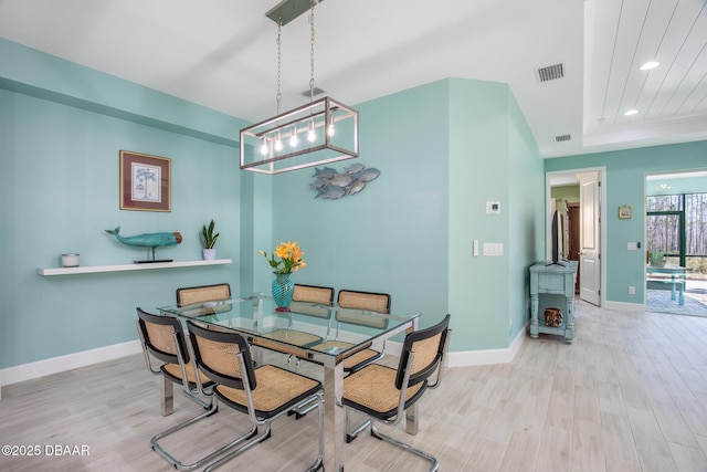 dining room featuring light hardwood / wood-style floors