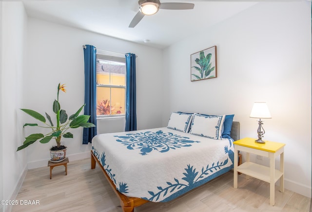 bedroom featuring ceiling fan and light wood-type flooring