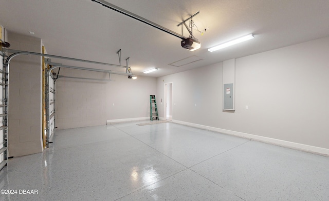 garage featuring a garage door opener and electric panel