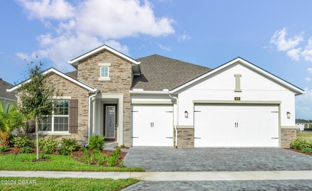 craftsman-style home featuring a garage