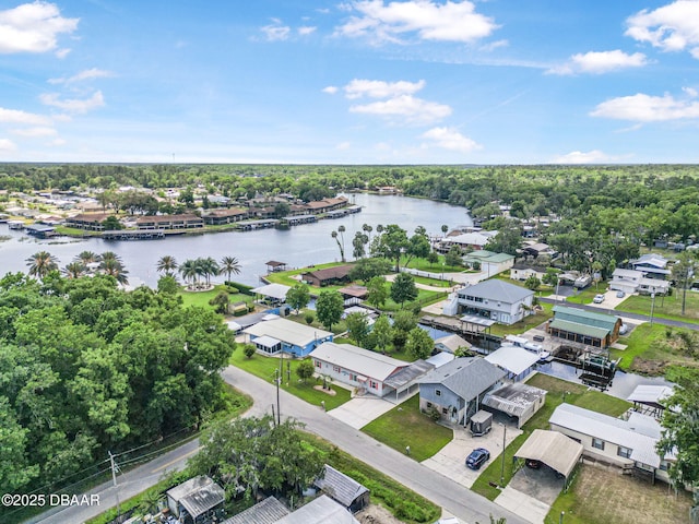 bird's eye view with a residential view and a water view