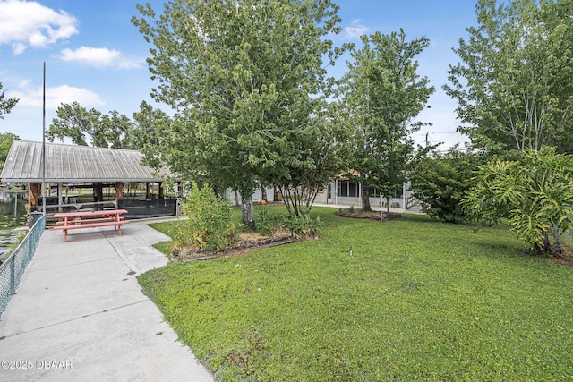 surrounding community with a lawn