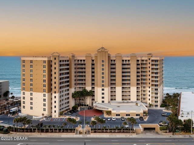 2403 S Atlantic Ave Unit 410, Daytona Beach, FL 32118 - property at dusk featuring a water view