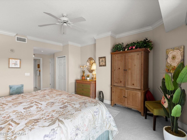 2403 S Atlantic Ave Unit 410, Daytona Beach, FL 32118 - bedroom with ornamental molding, light colored carpet, ceiling fan, and a closet