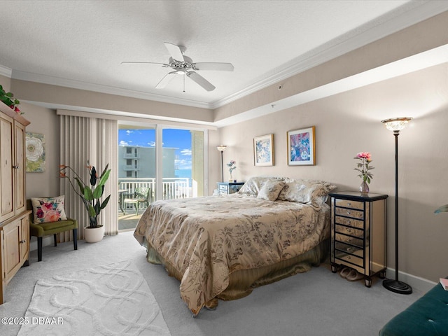 2403 S Atlantic Ave Unit 410, Daytona Beach, FL 32118 - bedroom with light carpet, access to outside, ornamental molding, a ceiling fan, and baseboards