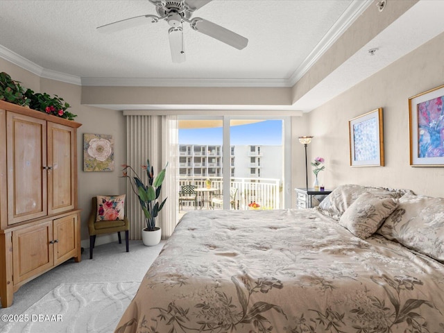 2403 S Atlantic Ave Unit 410, Daytona Beach, FL 32118 - bedroom featuring access to outside, light colored carpet, crown molding, a textured ceiling, and a ceiling fan