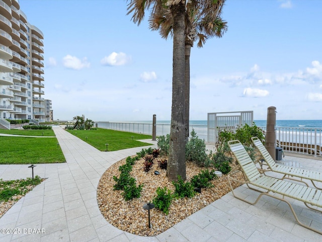 2403 S Atlantic Ave Unit 410, Daytona Beach, FL 32118 - view of property's community featuring a yard and a water view