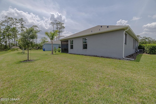 3013 Kenmare St, Ormond Beach, FL 32174 - view of grassy yard featuring central air condition unit