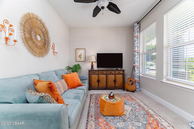 3013 Kenmare St, Ormond Beach, FL 32174 - carpeted living room featuring a ceiling fan and baseboards